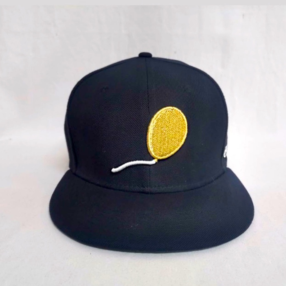 The Faction Gold Balloon snap back fitted cap. Essential head gear